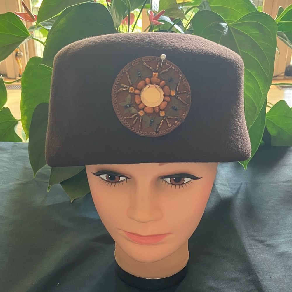Stylish Brown Wool Hat with Decorative Round Embellishment